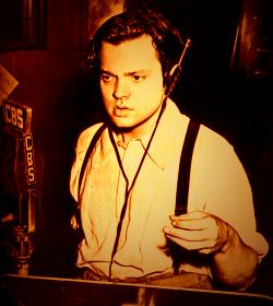 Orson Welles at old style microphone